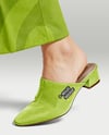 Pair of Suede Mules on Woman's Legs Mockup