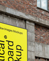 Outdoor Vertical Billboard on a Building Mockup