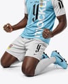 Soccer Player Wearing Raglan Jersey and Shorts Mockup