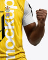 Soccer Player Wearing Jersey and Shorts Holds Cup Mockup