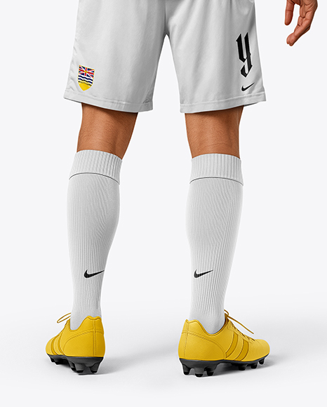 Soccer Player Wearing Jersey and Shorts Mockup