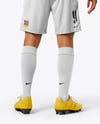 Soccer Player Wearing Jersey and Shorts Mockup
