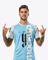 Man Wearing Soccer Jersey and Shorts Mockup