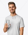 Man Wearing a T-shirt Holding 16oz Drink Can Mockup