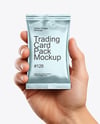 Metallic Trading Card Pack in a Hand Mockup