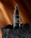 Amber Dropper Bottle on the Rock Mockup