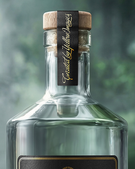 Dry Gin Bottle Surrounded by Forest Mockup