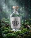 Dry Gin Bottle Surrounded by Forest Mockup