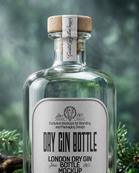 Dry Gin Bottle Surrounded by Forest Mockup
