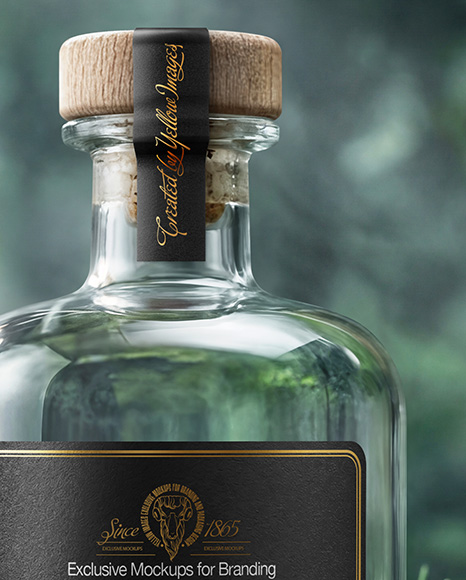 Dry Gin Bottle Surrounded by Forest Mockup