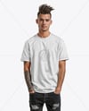 Young Man with Tattoo Wearing T-shirt and Ripped Jeans Mockup