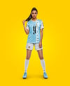 Female Soccer Player Wearing Jersey and Shorts Mockup
