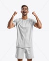 Man Wearing Crew Neck Soccer Jersey and Shorts Mockup