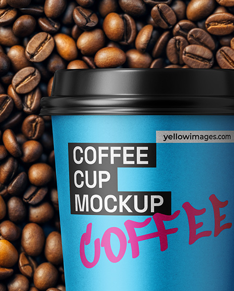 16oz Paper Cup on a Stack of Coffee Beans Mockup