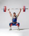 Man Wearing Weightlifing Suit with Barbell Mockup