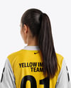Female Soccer Player Wearing Jersey and Shorts Mockup