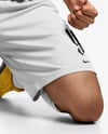 Soccer Player Wearing Jersey and Shorts Mockup