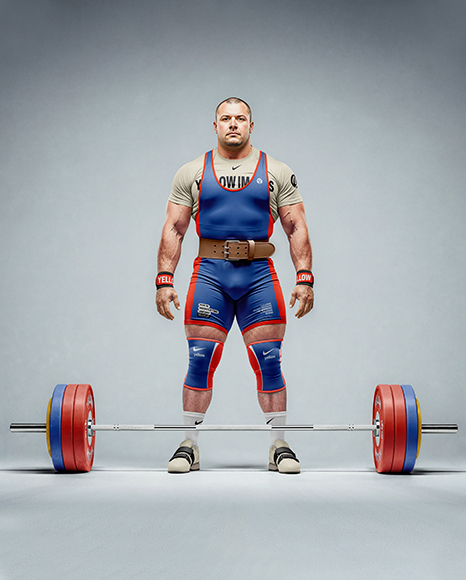 Man Wearing Weightlifing Suit with Barbell Mockup