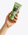 Cosmetic Tube in a Hand Mockup