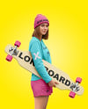 Young Woman Wearing Long Sleeve and Beanie with Longboard Mockup