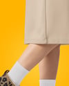 Pair of UGG Boots on Woman's Legs with Dress Mockup