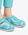 Pair of UGG Slippers on Woman's Legs Mockup