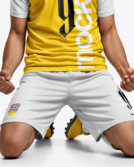 Soccer Player Wearing Jersey and Shorts Mockup