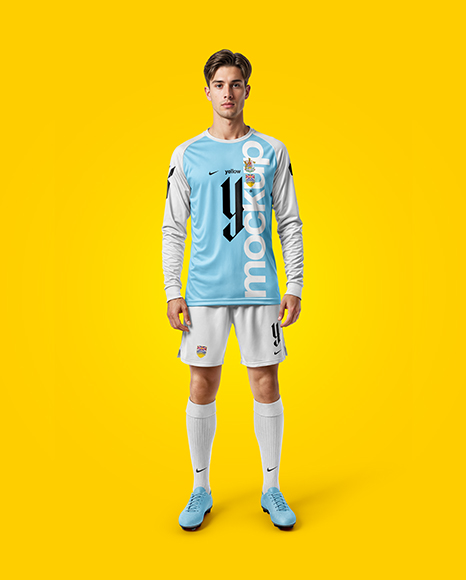 Man Wearing Long Sleeve Raglan Soccer Jersey and Shorts Mockup