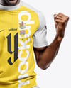 Black Man Wearing Raglan Soccer Jersey and Shorts Mockup