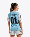 Female Soccer Player Wearing Jersey and Shorts Mockup
