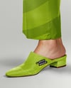 Pair of Suede Mules on Woman's Legs Mockup
