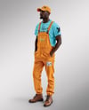 Afro-American Man Wearing a Bib Overalls and T-Shirt Mockup