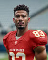 A Man Wearing a Full American Football Kit Mockup