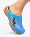 Pair of Clogs on Woman's Legs with Pants Mockup