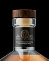 Whiskey Bottle on Black Background Mockup