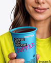 Woman Wearing a T-shirt Holding 16oz Paper Cup Mockup
