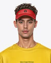 Young Man Wearing Oversized T-Shirt and Visor Cap Mockup