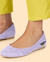 Pair of Suede Ballet Flats on Woman's Legs Mockup