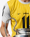 Man Wearing Soccer Jersey and Shorts Holds Cup Mockup