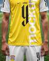 Soccer Player Wearing a Jersey and Shorts at the Stadium Mockup