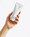 Cosmetic Tube in a Hand Mockup