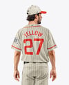 Baseball Player Wearing a Jersey and Cap Mockup