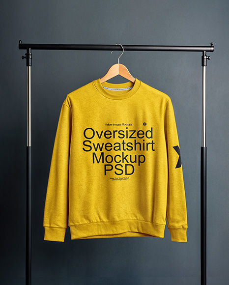 Sweatshirt on a Wooden Hanger Against a Plain Background Mockup - Blank sweatshirt mockup