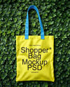 Tote Bag on a Green Leafy Background Mockup