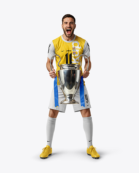 Man Wearing Soccer Jersey and Shorts Holds Cup Mockup - Jersey t shirt mockup
