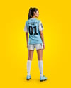 Female Soccer Player Wearing Jersey and Shorts Mockup