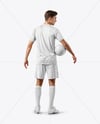 Man Wearing Soccer Jersey and Shorts Mockup
