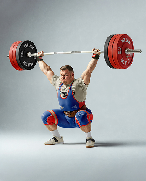 Man Wearing Weightlifing Suit with Barbell Mockup