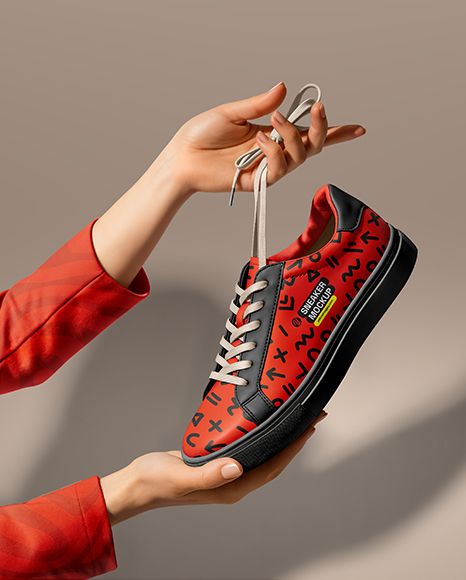 Woman's Hands Holding Sneaker Mockup