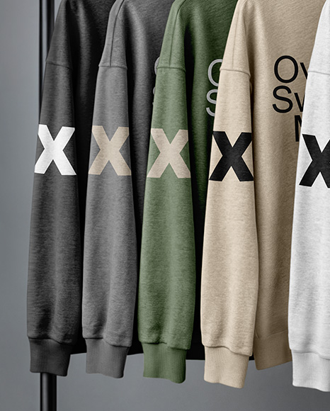 Five Sweatshirts on a Black Rack Against a Plain Background Mockup